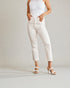Person wearing white pants and a white top on a plain background