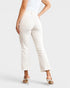 Jean taille haute gainant à ourlet brut en blanc cassé