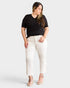 Jean taille haute gainant à ourlet brut en blanc cassé
