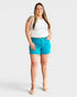 Shorts de mezclilla con cintura alta y dobladillo sin rematar que controlan el abdomen en verde azulado cristal