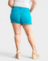 Shorts de mezclilla con cintura alta y dobladillo sin rematar que controlan el abdomen en verde azulado cristal