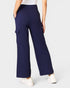 Navy blue wide-leg pants worn by a person on a white background