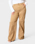 Tan pants worn by a person on a white background