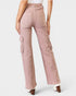 Pink cargo pants worn by a person on a white background