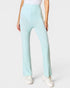 Light blue pants worn by a person on a white background
