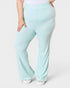Light blue pants worn by a person on a white background