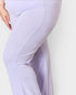 Lavender leggings worn by a person on a white background