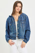 Woman wearing a blue denim jacket on a white background