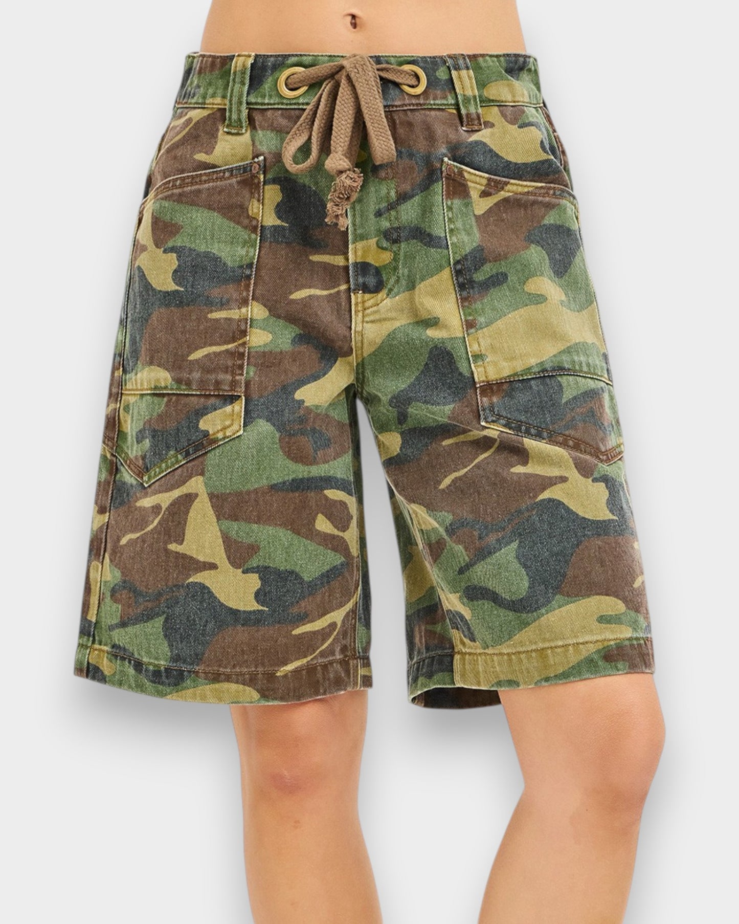 Camouflage shorts with a drawstring on a white background