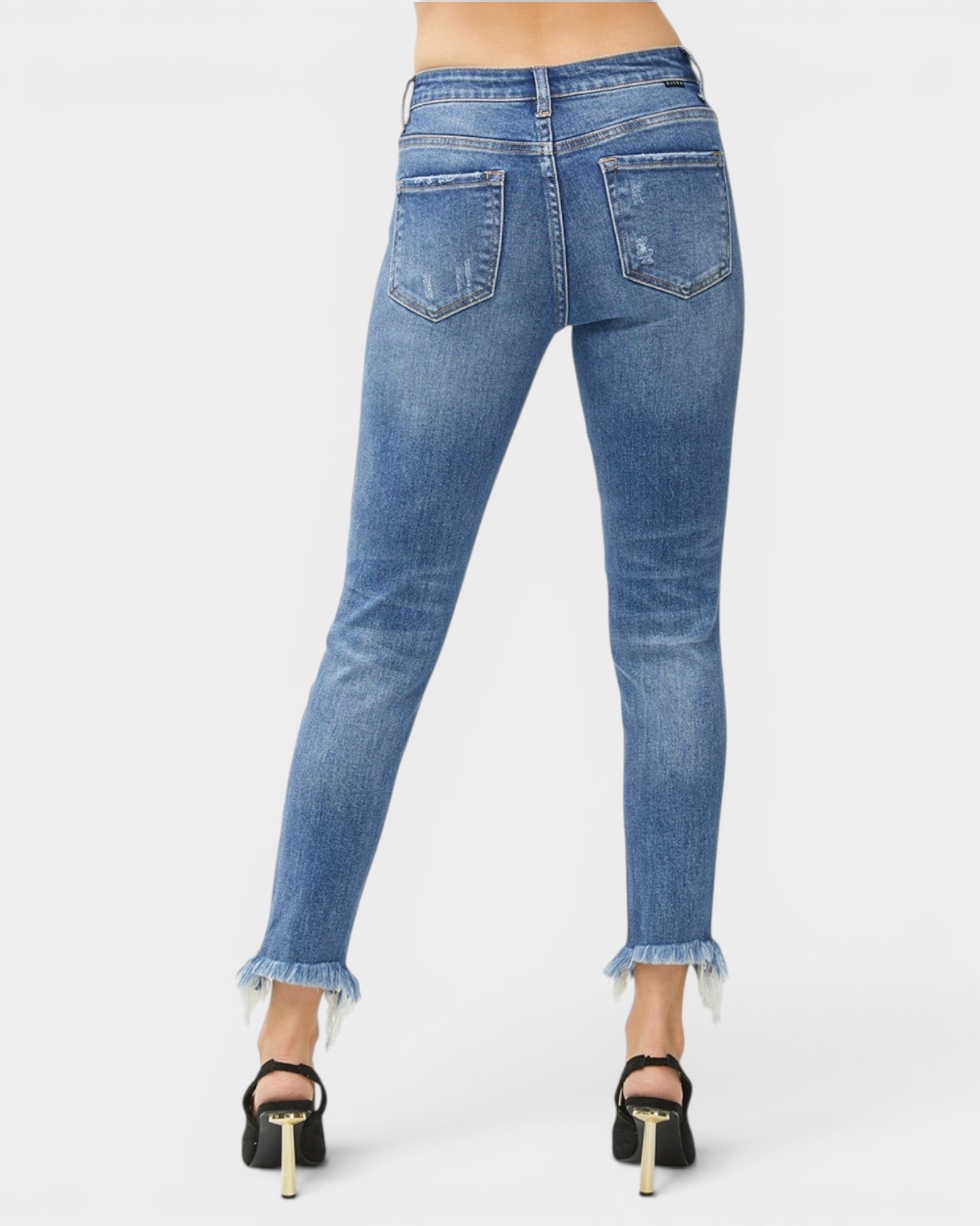 Blue jeans with a white background