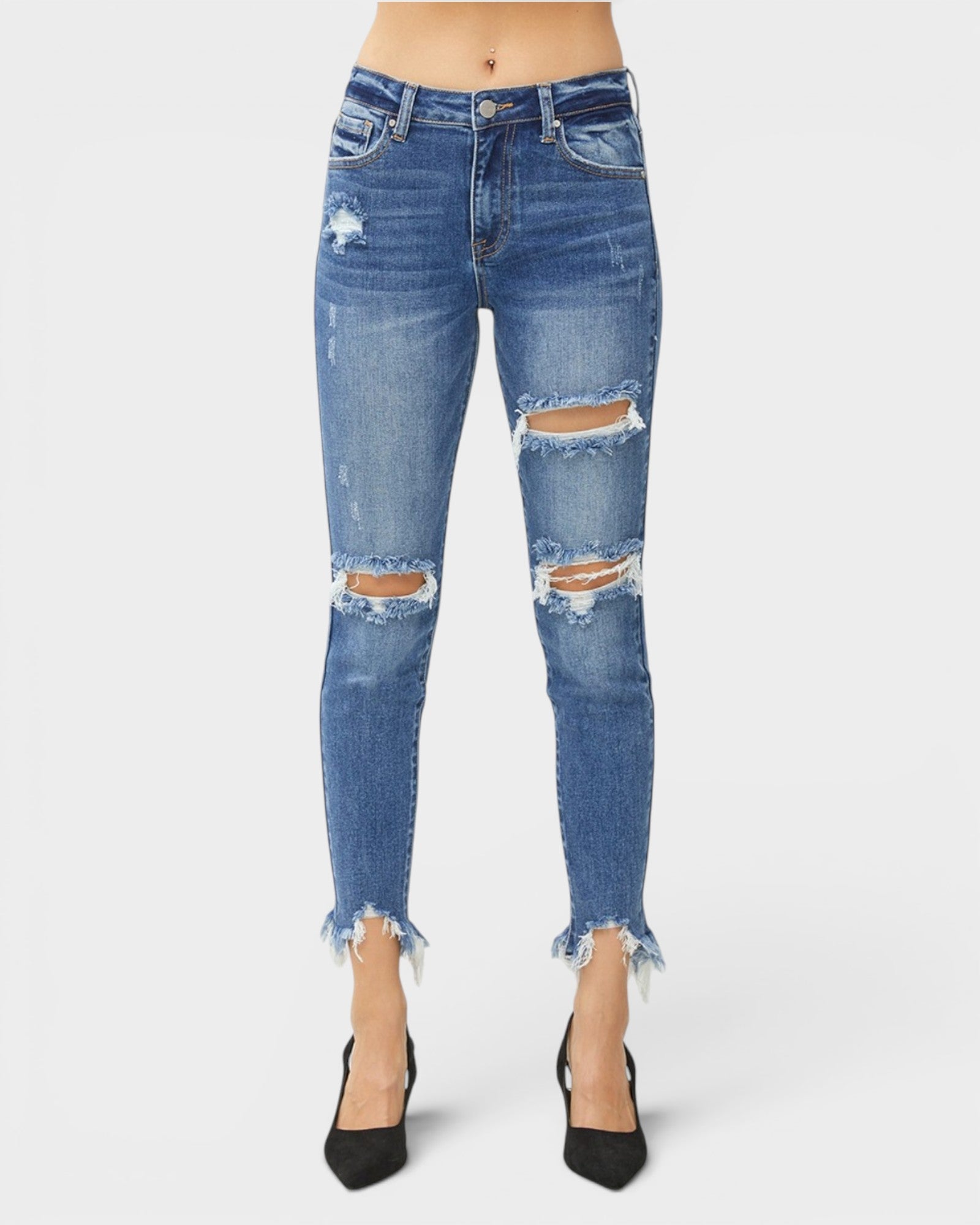 Blue distressed jeans on a white background
