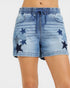 Denim shorts with star patterns on a white background