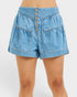 Blue denim shorts with button details on a white background