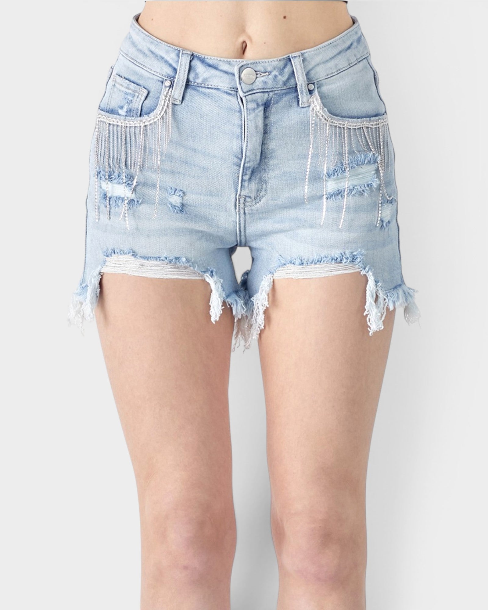 Light blue denim shorts with frayed edges on a white background