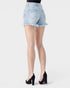 Light blue denim shorts worn by a person on a white background