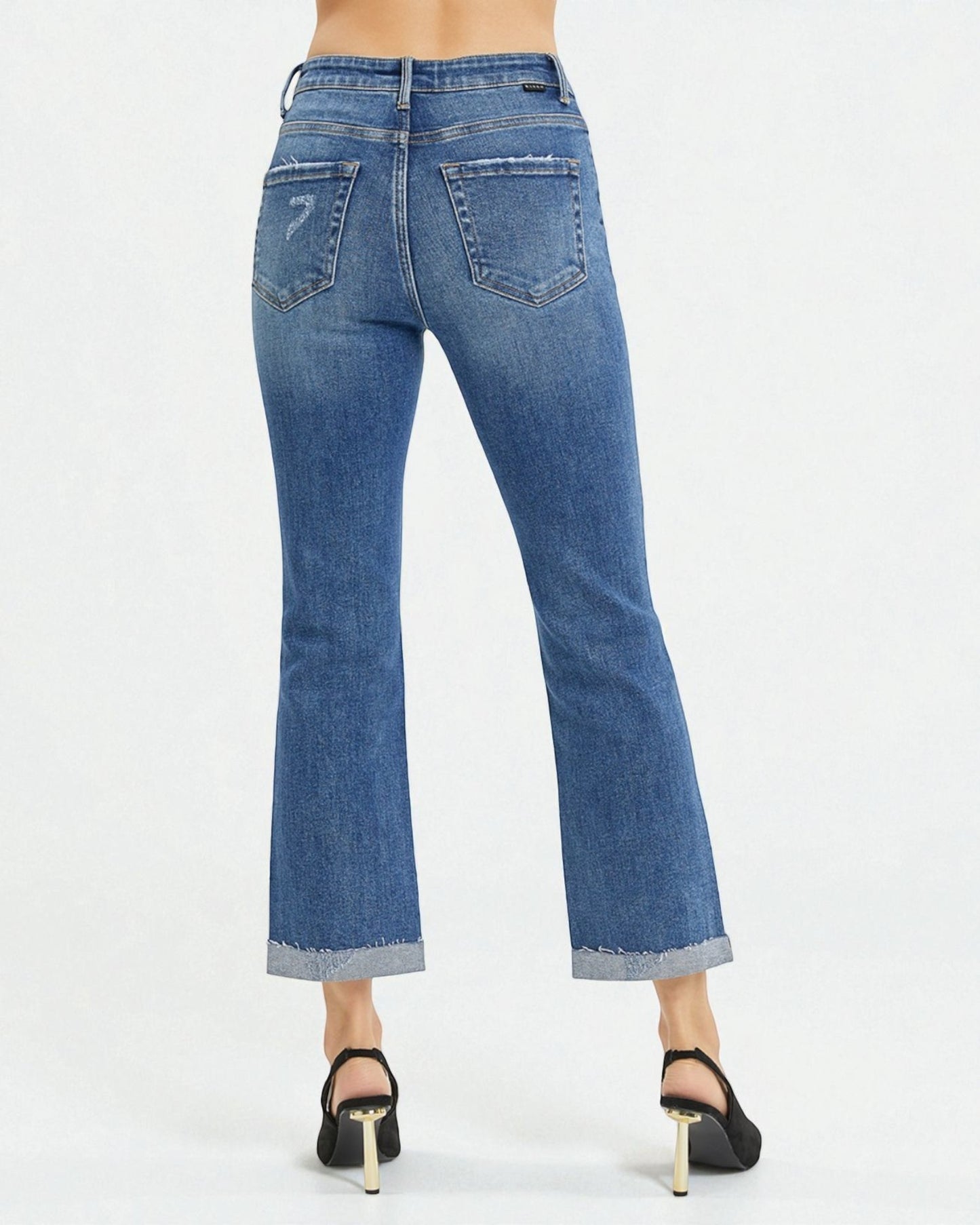 Blue jeans with a white background