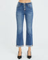 Blue jeans worn by a person on a white background