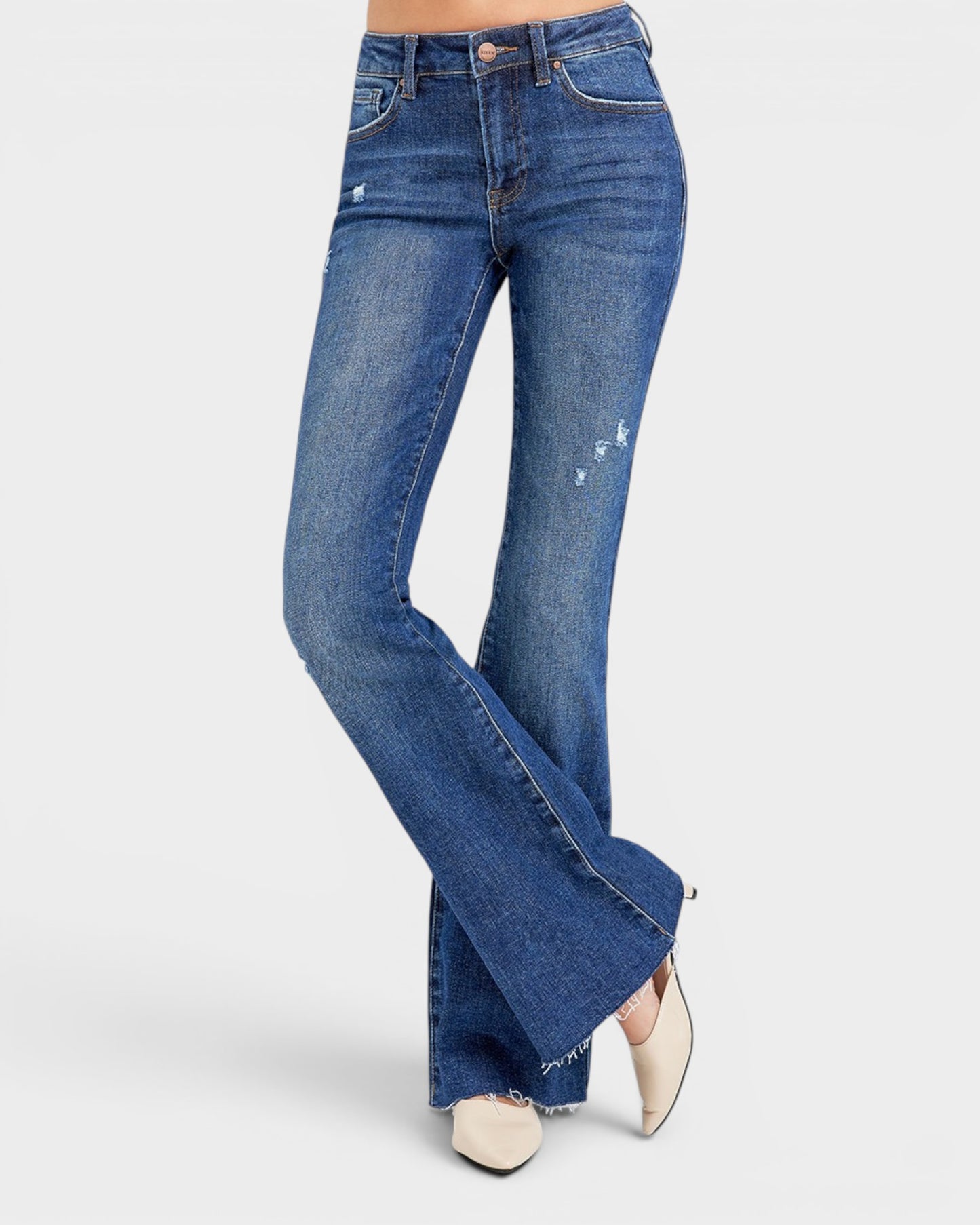 Blue flared jeans on a white background