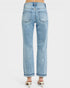 Light blue jeans worn by a person on a white background