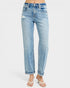Light blue jeans worn by a person on a white background