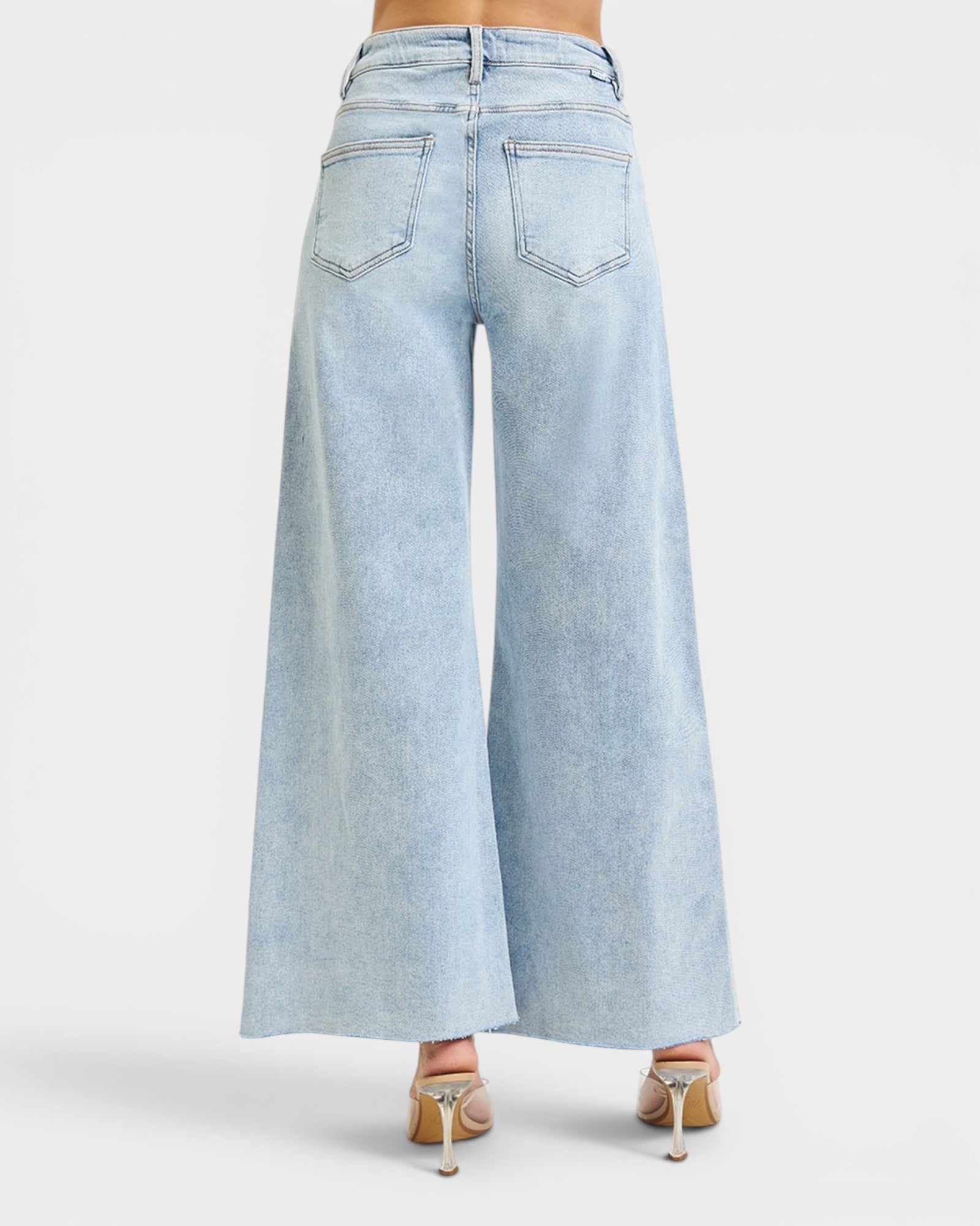 Light blue wide-leg jeans on a white background