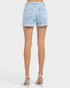 Light blue denim shorts worn by a person on a white background
