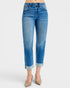 Blue jeans worn by a person on a white background