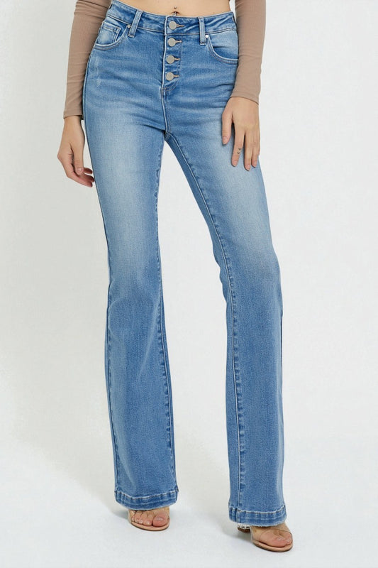 Light blue jeans worn by a person on a white background