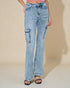 Light blue jeans worn by a person on a beige background