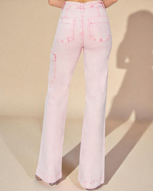 Pink flared jeans on a beige background