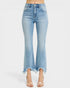 Light blue jeans with a frayed hem on a white background