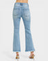 Light blue jeans with a white background