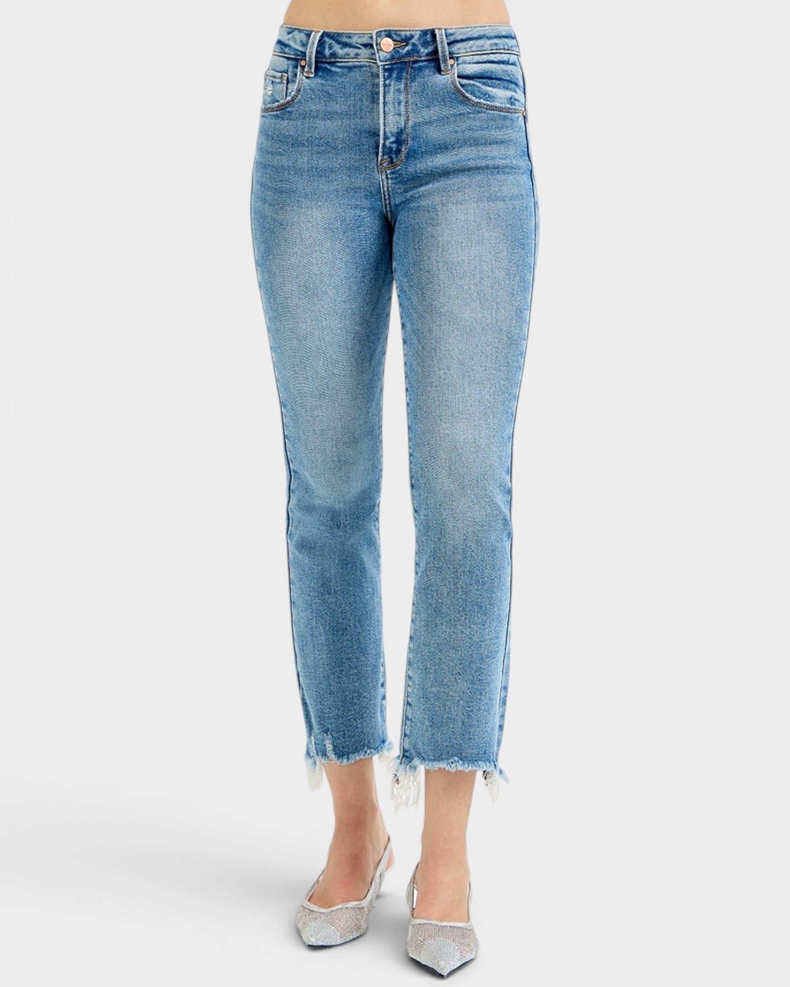 Light blue jeans with a frayed hem on a white background
