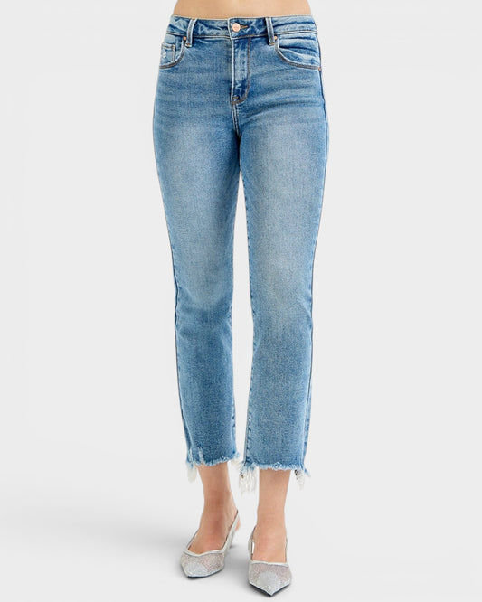 Light blue jeans with a frayed hem on a white background
