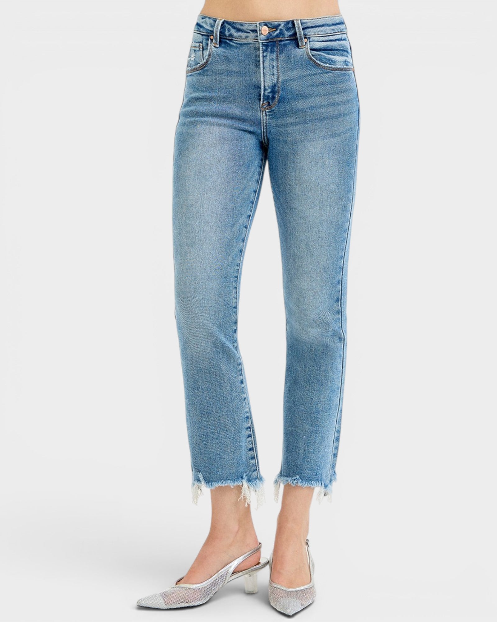 Light blue jeans worn by a person on a white background