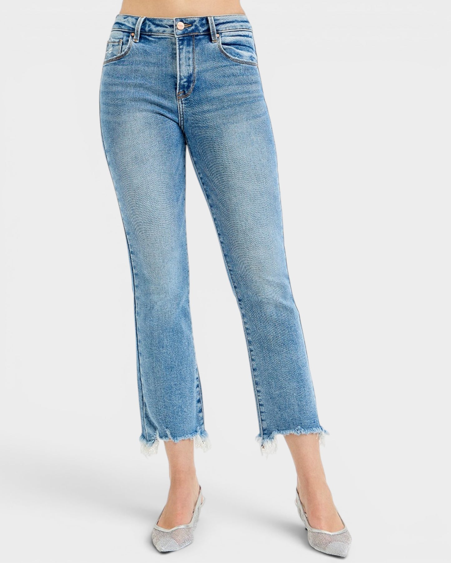 Light blue jeans worn by a person on a white background