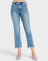 Light blue jeans worn by a person on a white background