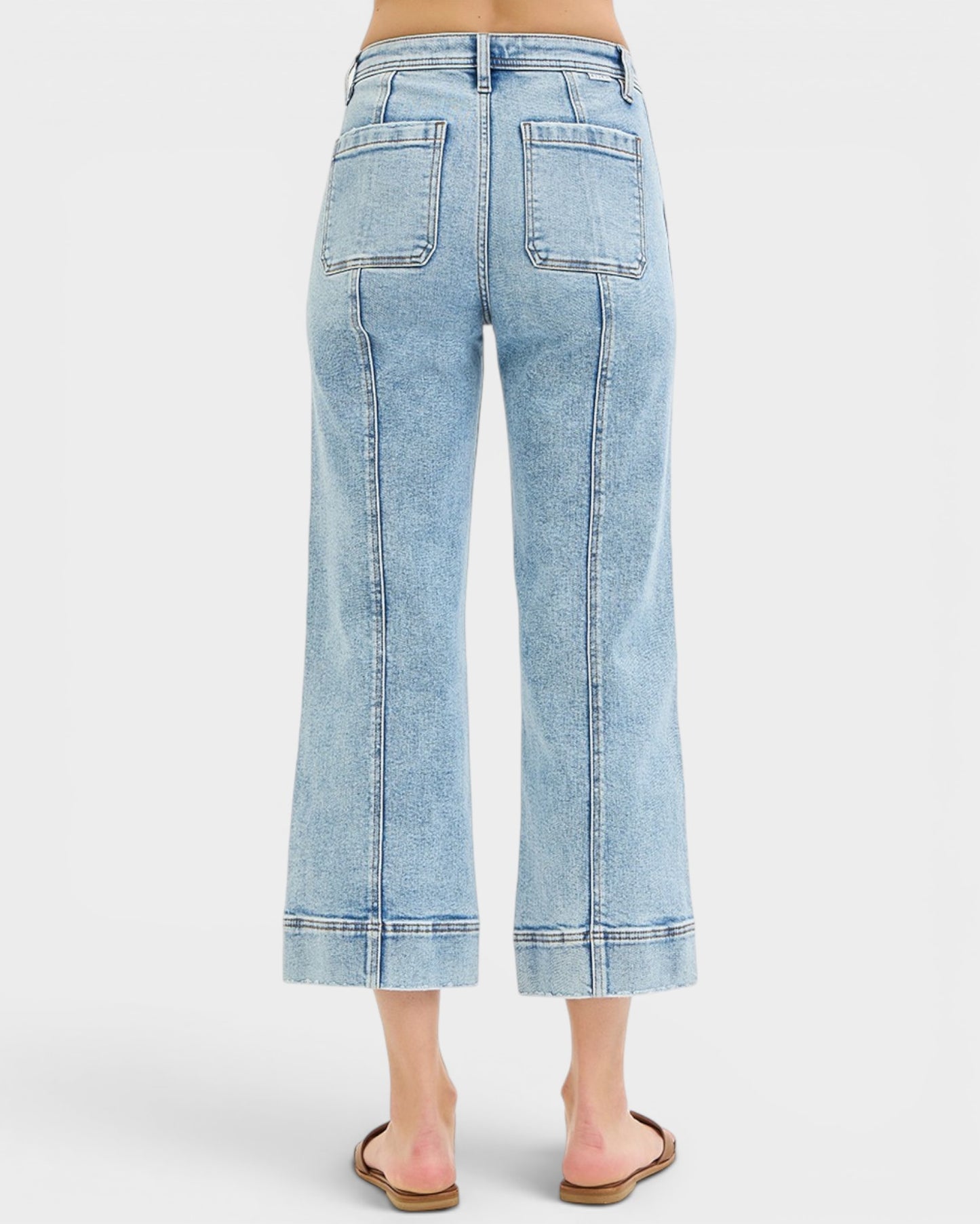 Light blue denim wide-leg jeans on a white background