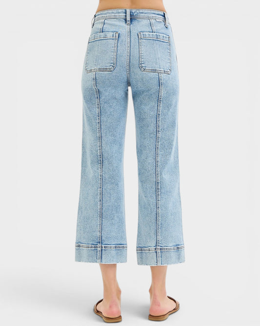 Light blue denim wide-leg jeans on a white background