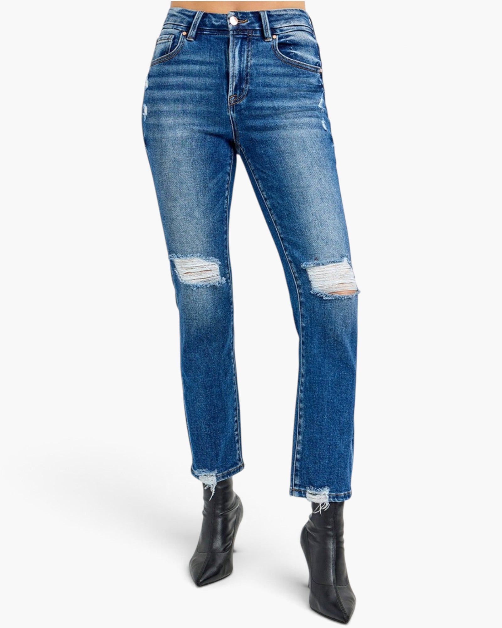 A pair of high-waisted, distressed blue denim jeans with ripped details on the thighs and knees, styled with black pointed-toe ankle boots against a plain white background.