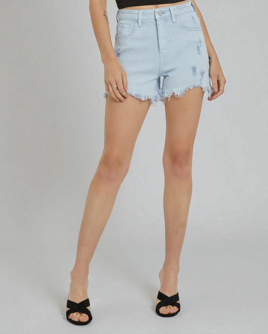 Light blue denim shorts worn by a person on a plain background