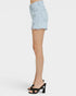 Light blue denim shorts worn by a person on a white background