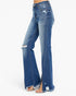 Medium wash blue denim flare jeans with distressed details, frayed hems, and front split details, shown on a model against a white background.