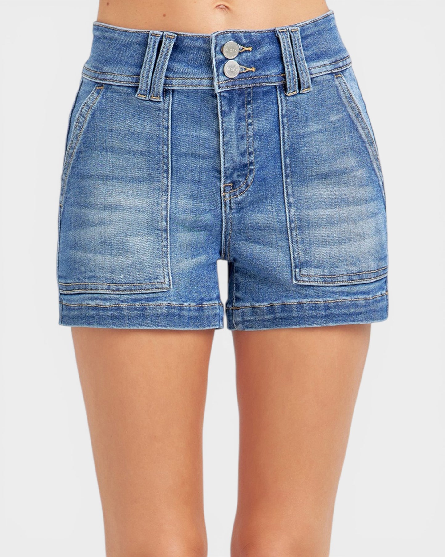 Blue denim shorts on a white background
