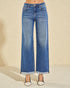 Blue wide-leg jeans on a neutral background