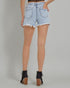 Light blue denim shorts worn by a person on a gray background
