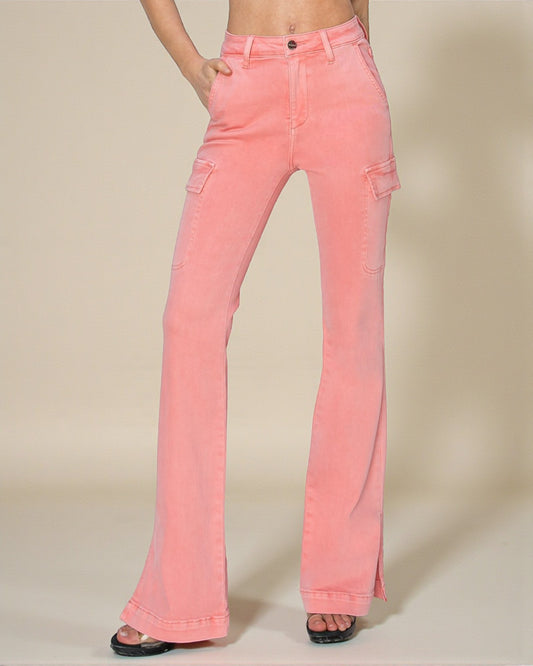 Pink flared jeans on a beige background