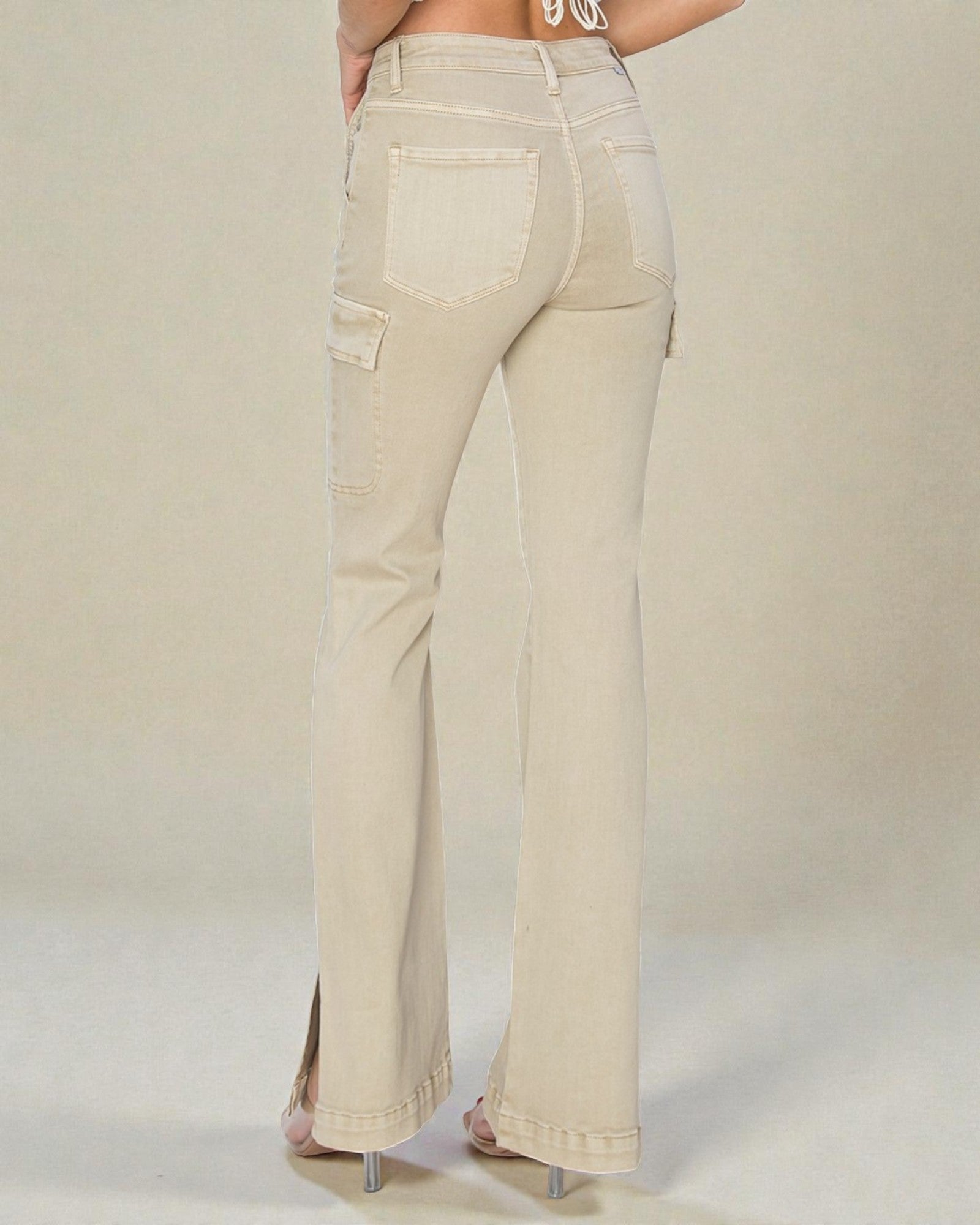 Beige pants worn by a person on a plain background