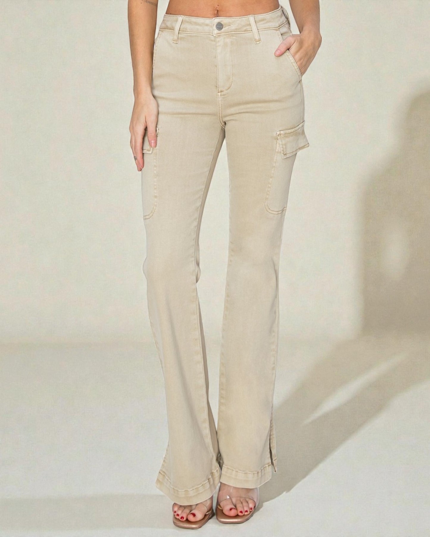 Beige pants worn by a person on a plain background