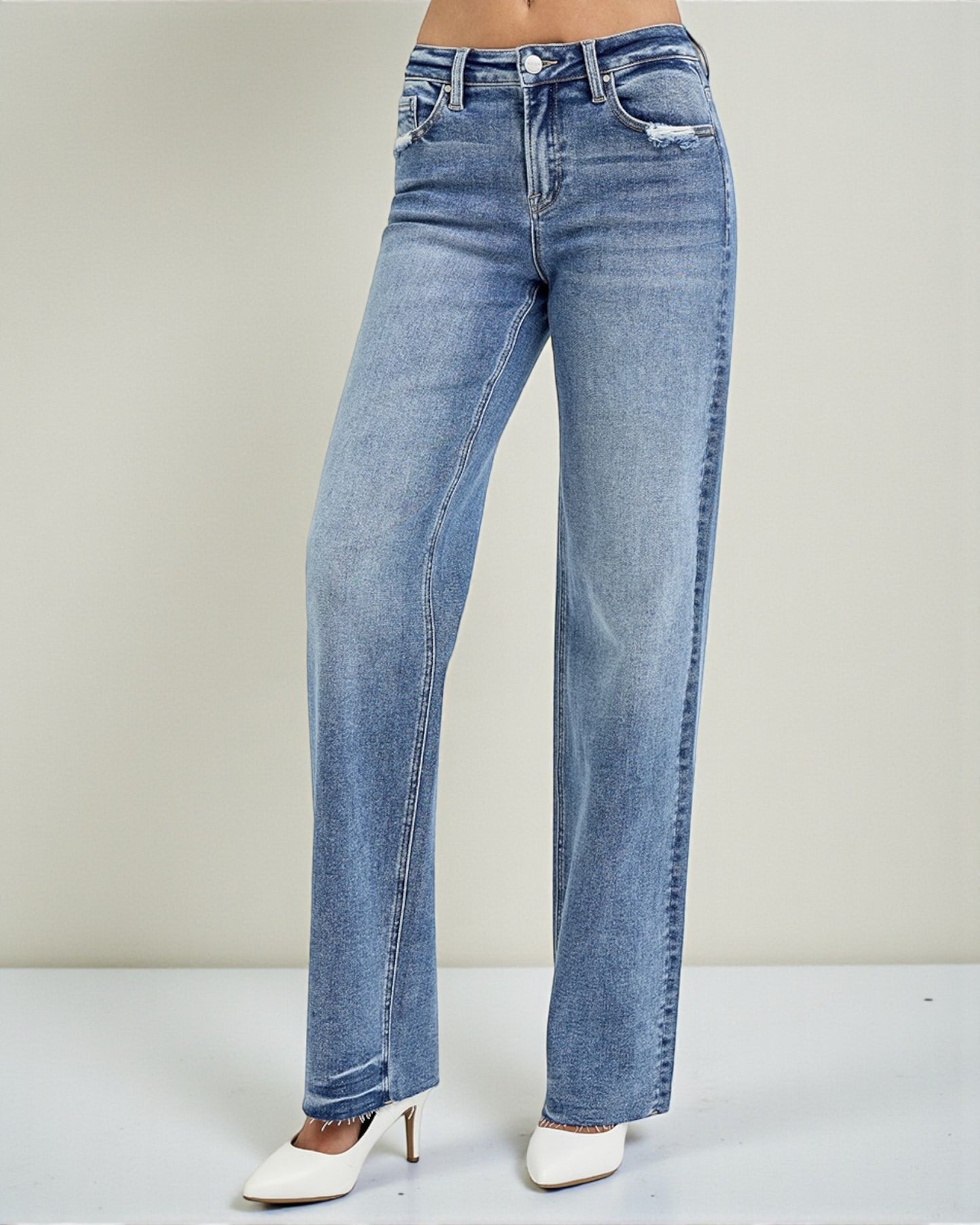 Blue jeans on a plain background